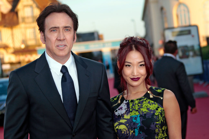 Alice Kim & Nicolas Cage | Getty Images Photo by CHARLY TRIBALLEAU/AFP