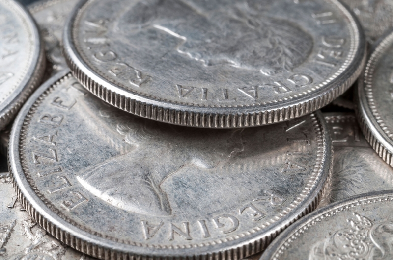 Hendiduras en monedas | Alamy Stock Photo