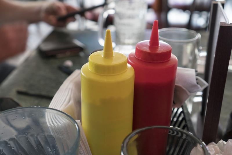 Make Decorating Cleaner Using Condiment Bottles | Shutterstock