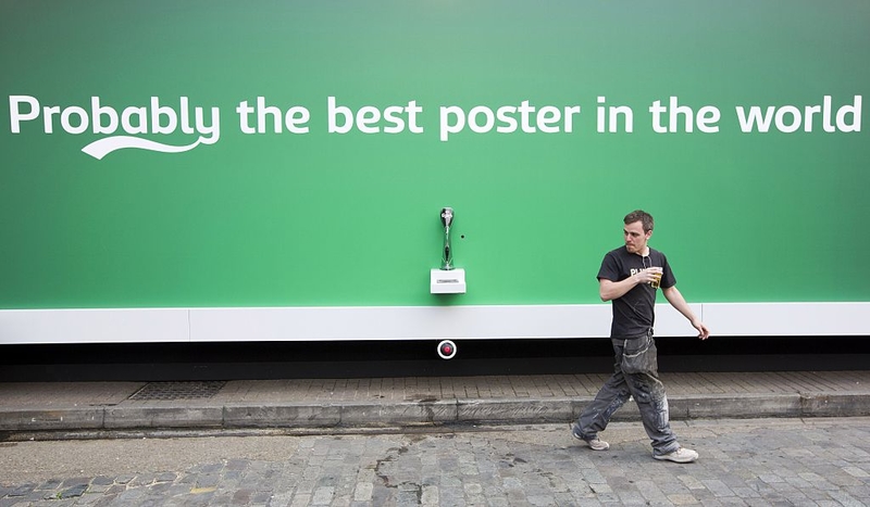 Carlsberg’s Billboard Is on-Tap | Getty Images Photo by JUSTIN TALLIS/AFP 