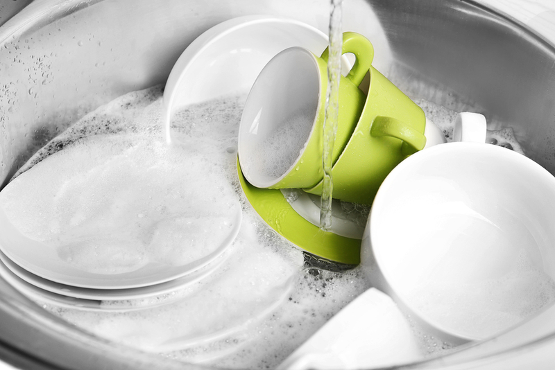 Dishes that Have Been Left in the Sink | Shutterstock