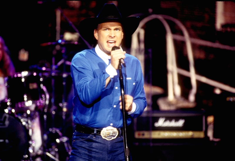 Garth Brooks Then | Getty Images Photo by L. Cohen/WireImage