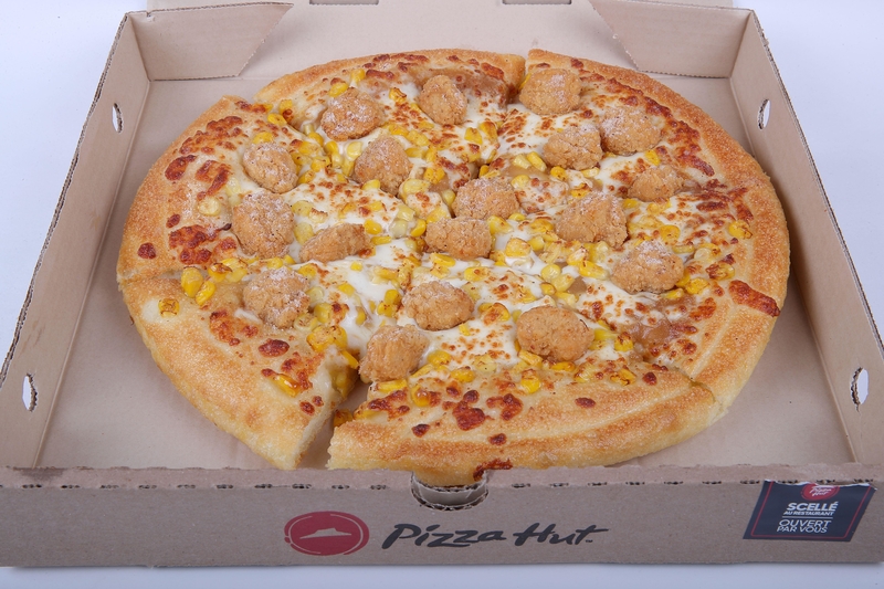 Is It Pizza? Is It Chicken? It's Both! | Alamy Stock Photo