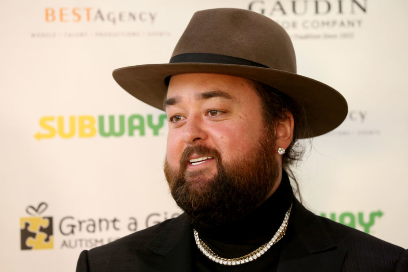 Chumlee y sus guardaespaldas | Getty Images Photo by Gabe Ginsberg