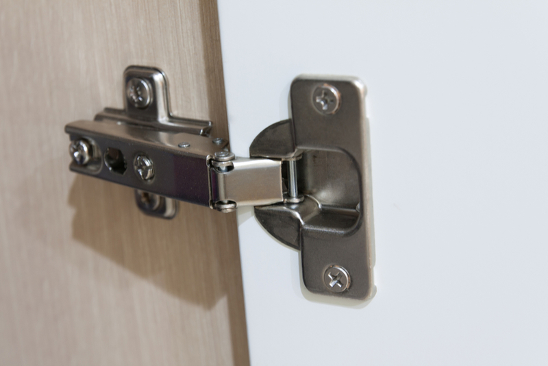 Lube Up Sticky Cabinet Doors | Shutterstock