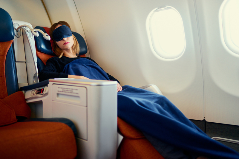 Some Tips That’ll Help You Sleep Better on a Plane | Shutterstock