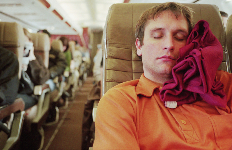 Some Tips That’ll Help You Sleep Better on a Plane | Getty Images