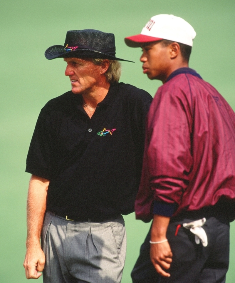 Greg Norman and Tiger Woods | Getty Images Photo by Augusta National